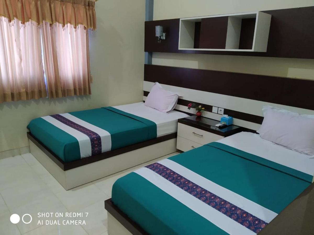 Hotel Pilar Mosa Muarawahau Екстериор снимка