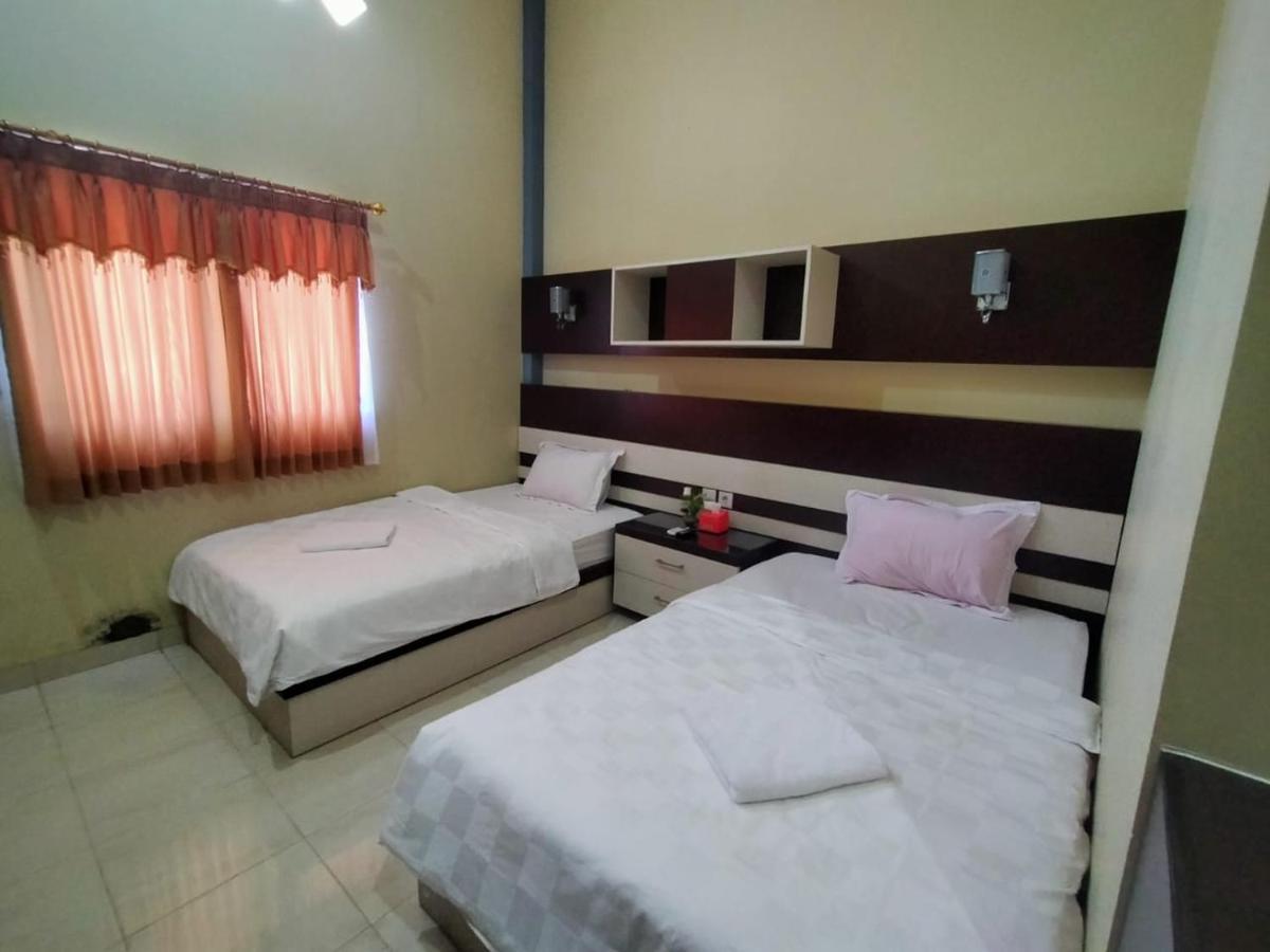 Hotel Pilar Mosa Muarawahau Екстериор снимка